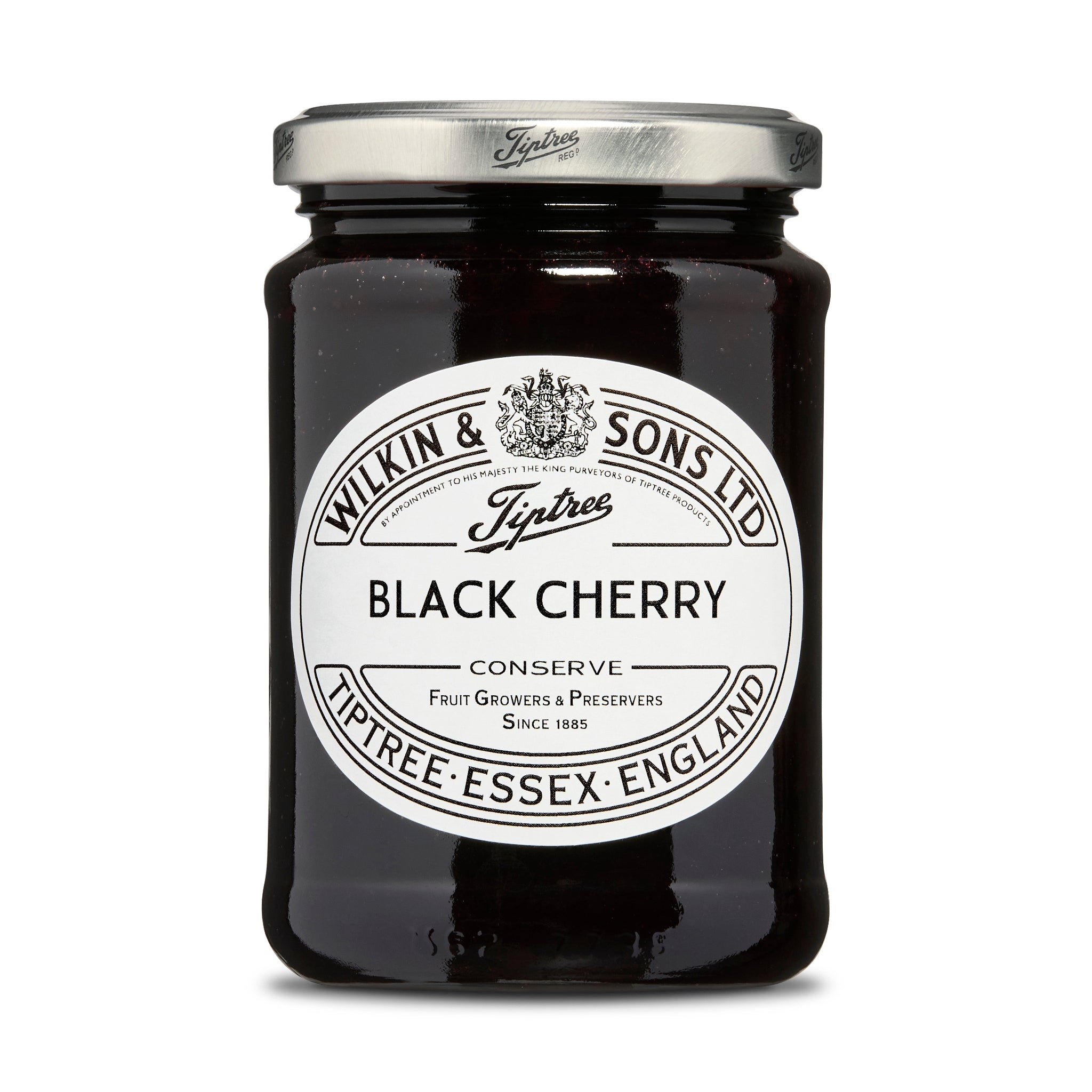 Jar of black cherry conserve with a white label on a white background