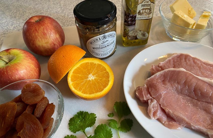 pork chops with a fruit sauce - black currant jam or medlar jelly