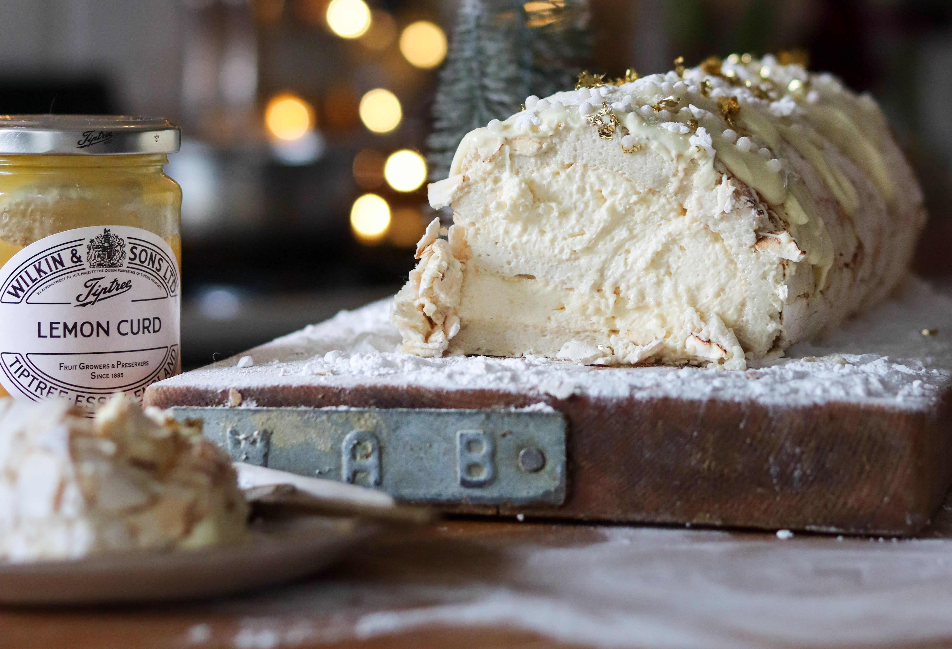 Lemon Curd & White Chocolate Yule-ade Roulade by The Boho Baker