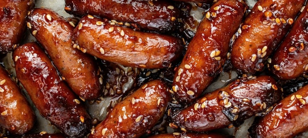 Sticky Damson and Sesame Sausages