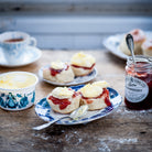 A classic cream tea, a scone with Strawberry jam and clotted cream.